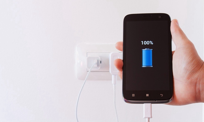  A Battery Charger Charges A Mobile Phone